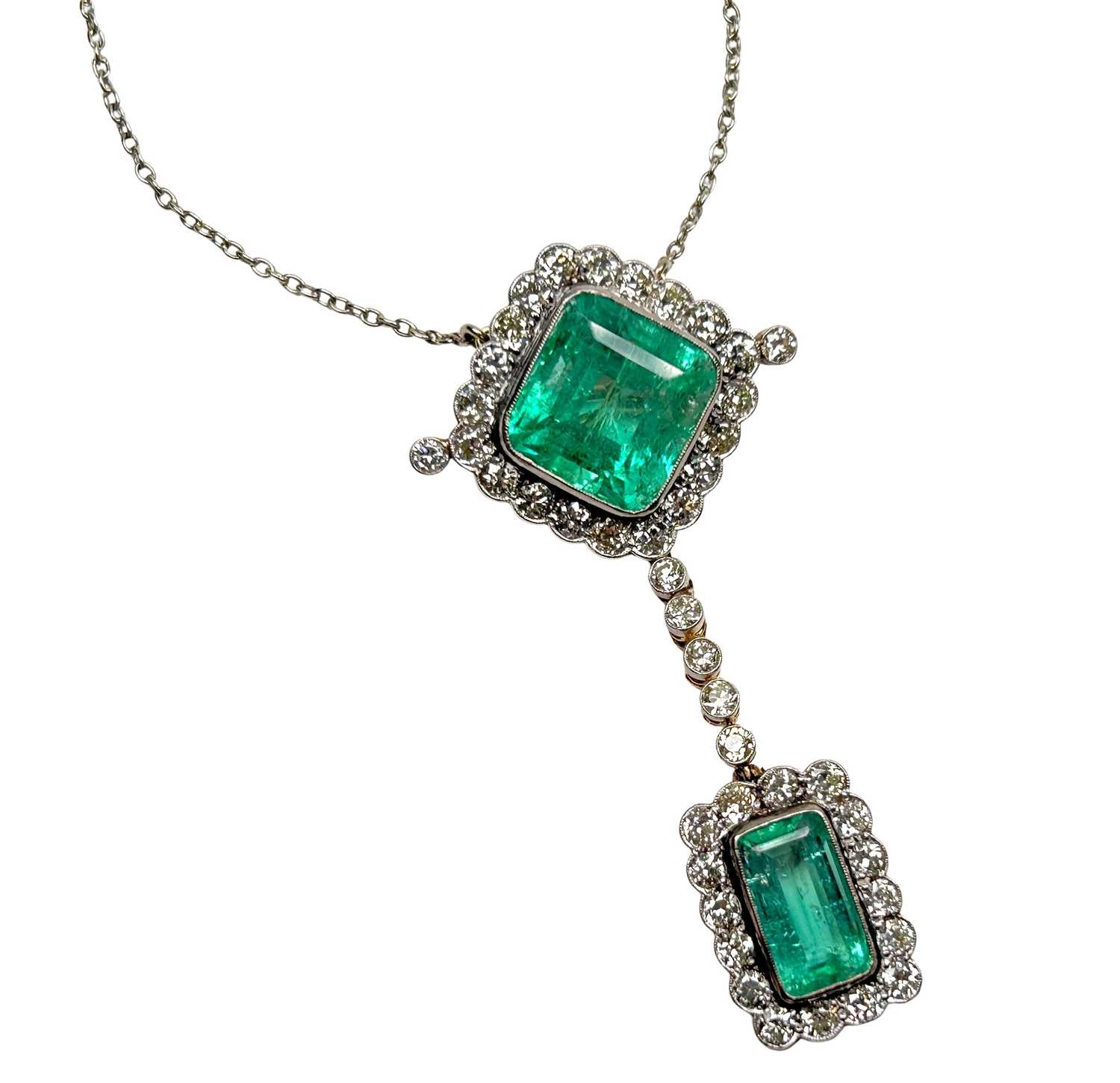 Lot 178 - A Spectacular Emerald Diamond Pendant.