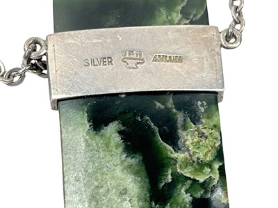 Lot 243 - Sterling Silver Chain with Green Stone Pendant.
