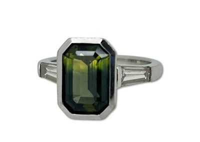 Lot 251 - Emerald Cut Sapphire Ring.