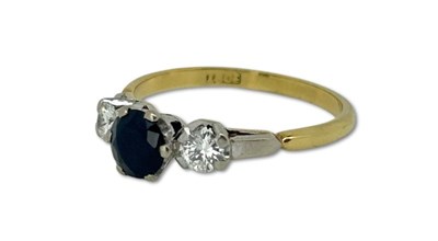 Lot 261 - Petite Three Stone Ring.
