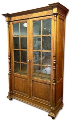 Lot 136 - French Oak Two-Door Glazed Bookcase.