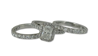 Lot 250 - A Quality Diamond Ring and Wedding Ring Package.