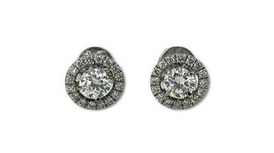 Lot 300 - Diamond Halo Studs.