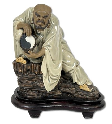 Lot 204 - Shiwan Porcelain Demon Sculpture.
