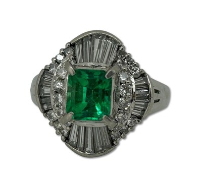 Lot 256 - Emerald and Diamond Ring.