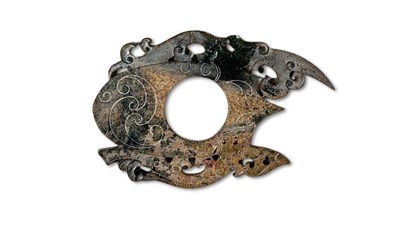 Lot 216 - Calcified Hardstone Archer's Ring Pendant.