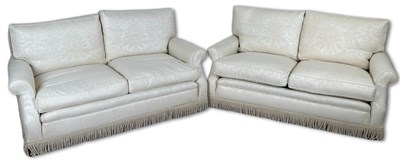 Lot 71 - A Pair of Cream Floral Upholstered Sofas.