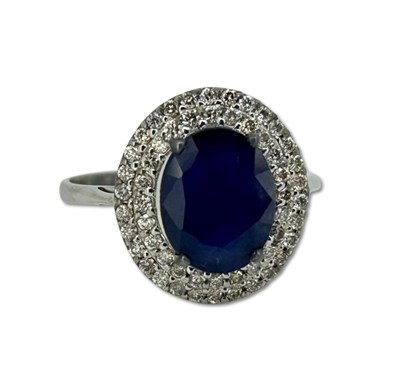 Lot 240 - Sapphire and Diamond Cluster.