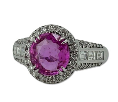 Lot 242 - White Gold Pink Sapphire Ring.