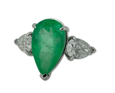 Lot 253 - Pear Shaped Emerald and Diamond Ring.