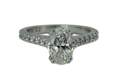 Lot 239 - Glittering Oval Cut Diamond Ring.